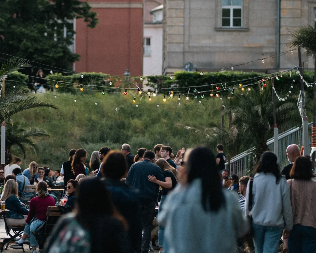 Community Bank Marketing: 10 Strategies for Growth Residents gathering at a local community event that supports businesses and community engagement